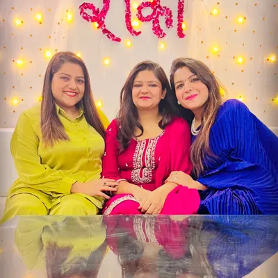 A photo from a family Roka ceremony. I'm wearing a royal blue pleated co-ord set, a comfortable yet festive choice for family functions.