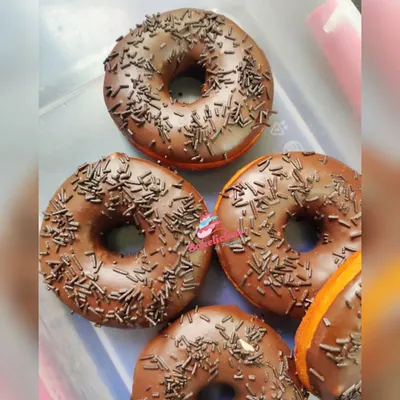 A close-up of my popular chocolate-glazed doughnuts. They are incredibly soft and made without any eggs or preservatives. Perfect for an afternoon pick-me-up or a treat for the kids.