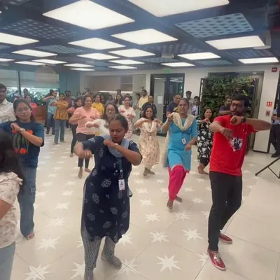 An action shot from our Zumba workshop at Pearson India. You can see the employees fully engaged in the routine, following along with our instructor and having a great time.
