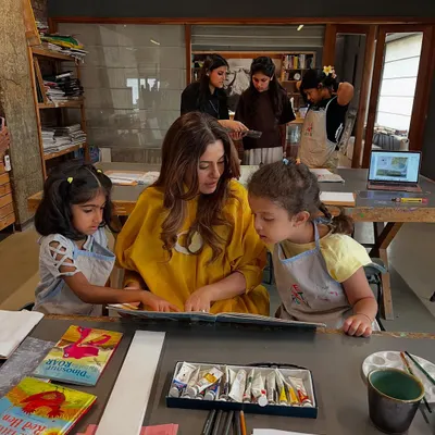 An instructor reads a story to our youngest campers, sparking ideas for the book-making project ahead. Our summer camps are filled with joyful moments of making art and creative storytelling.