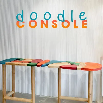 Introducing the "Doodle Console," a custom piece inspired by pure creativity. Made from solid wood with interlocking shapes in vibrant colors, this console is a celebration of playful design and expert craftsmanship.