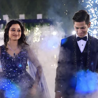 A magical entry for the couple, complete with smoke effects that created a dreamy, walking-on-clouds feel. I coordinate with the technical team to ensure these effects are timed perfectly.