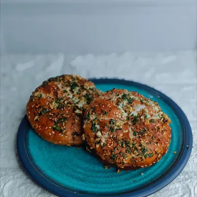 I'm so excited to add these creamy, eggless Korean garlic cheese buns to my menu. They are savory, cheesy, and incredibly scrumptious. A must try!