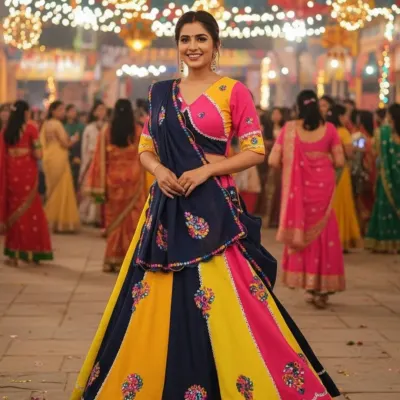 Get ready for Dandiya nights with this beautiful and colorful Navratri chaniya choli. The combination of navy, yellow, and pink with traditional embroidery is perfect for festive celebrations.