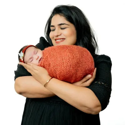 The warmth of a mother's embrace is a memory to cherish. I aim to capture that pure love and happiness in simple, beautiful portraits.