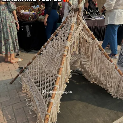 Our handmade macrame teepee was a huge hit at the exhibition. It's a perfect, magical play space for kids or a unique decor piece for a boho-themed event.