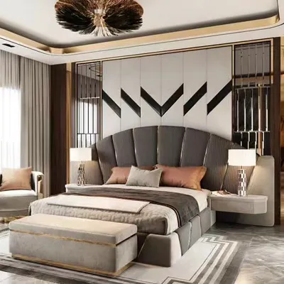 A luxurious master bedroom featuring a dramatic winged headboard, geometric wall paneling, and a stunning feather-like chandelier. The design uses a rich combination of textures and metallic accents for a high-end feel.