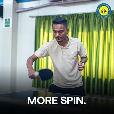 A player demonstrates how to generate heavy spin on the ball. Our indoor facility is the perfect place to practice advanced techniques like topspin, backspin, and sidespin.
