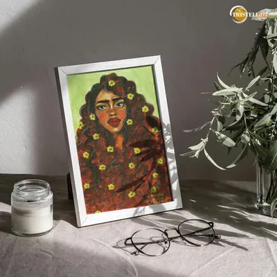 This framed portrait, created with poster colors, shows how my art can bring a touch of warmth and personality to any space. I focused on creating a gentle expression with floral elements woven into the hair.