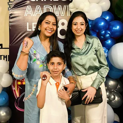 The birthday boy and his family showing off their fun glitter tattoos. I can add extra activities like tattoos and games to make the celebration even more special.
