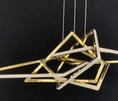 This geometric LED pendant is a true statement of modern design, featuring interlocking triangular forms in stainless steel. It's an abstract, sculptural piece that brings a dynamic and artistic energy to any contemporary space.