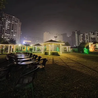 This is the view that greets our evening guests. The entire lawn is illuminated with string lights, highlighting the gazebos and seating areas, creating an enchanting atmosphere for any night event.