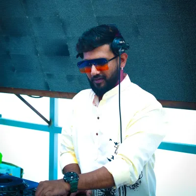 Behind the decks at a massive Holi event at Shift Marathahalli. The energy of a festival crowd is incredible.