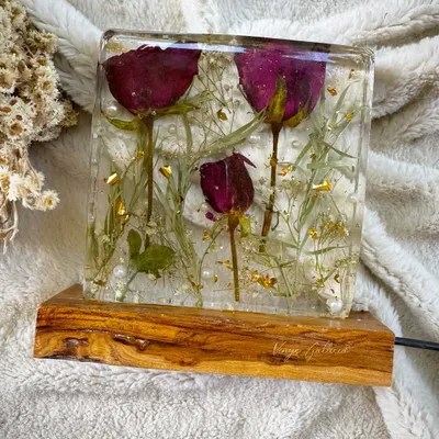 Preserved with love. A client's special bouquet roses transformed into a glowing memory, sealed forever in this handcrafted rectangular resin block lamp.