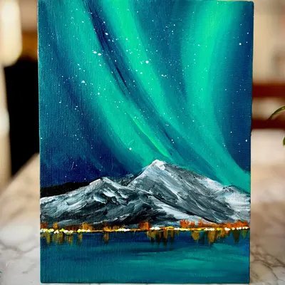 A stunning Northern Lights painting created in one of our workshops. You'll learn blending techniques to capture the magical glow of the aurora on canvas.
