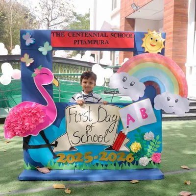 Small steps towards big dreams. A proud student poses at our 'First Day of School' photo booth, marking the beginning of an exciting educational journey.