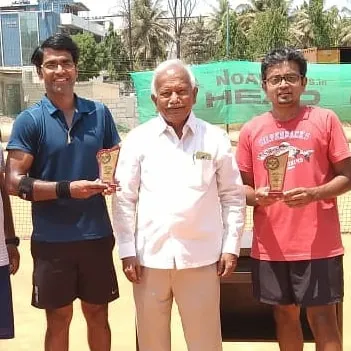 The proud winners from our latest corporate tennis tournament. These events are a highlight for our community, bringing everyone together for some fun and competitive play.