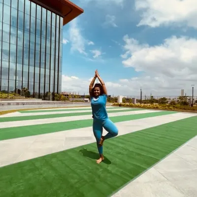 Practicing Vrikshasana (Tree Pose) on Yoga Day. Movement is my medicine, and I believe in incorporating different disciplines like yoga for balance and flexibility.