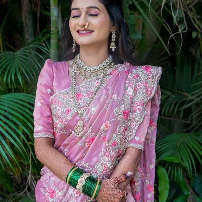A portrait of a radiant bride, her smile lighting up the frame. We aim to capture the genuine happiness and bridal glow, creating timeless portraits that reflect your joy.