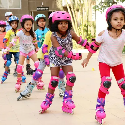 Our beginner group learning to move together in a line. I teach kids in a fun way, ensuring they are always wearing full protective gear, including helmets and pads.