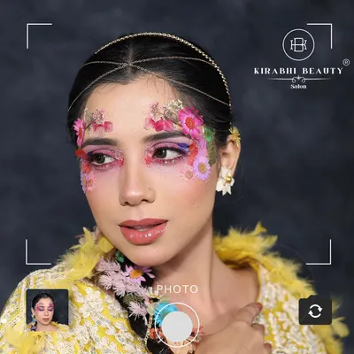 This artistic floral makeup is one of my favorite creative looks. I used real dried flowers and a blend of pink and purple pigments to create a fantasy-inspired look.