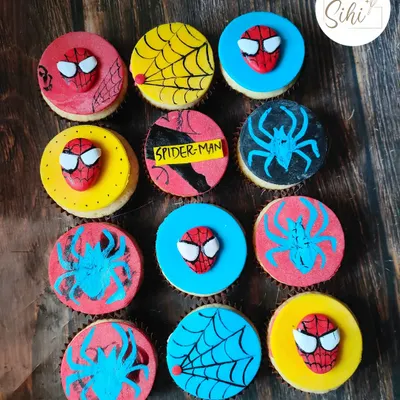 Your friendly neighborhood Spider-Man, in cupcake form. This set includes a mix of 3D fondant Spidey masks, hand-painted logos, and web designs.