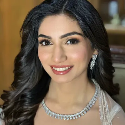 A classic Roka bride look. I created a soft, natural glam with a flawless base, subtly defined eyes, and a glossy pink lip, paired with beautiful soft waves in her hair.
