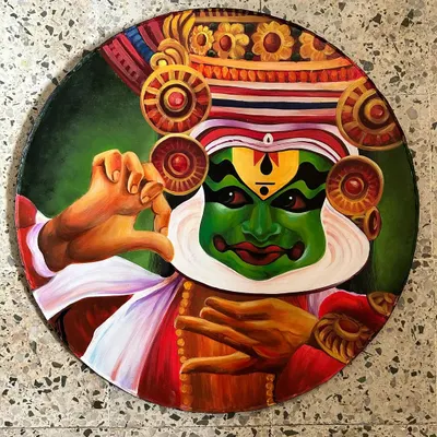 A hand-painted circular canvas depicting a Kathakali dancer, capturing the 'Adbhutam' (wonder) expression. This piece is part of a series celebrating the nine 'Navarasas' or emotions of classical Indian dance.