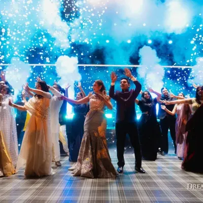 A high-energy sangeet performance complete with CO2 jets and a dynamic stage setup. We design our events to be full-sensory experiences, ensuring the entertainment is as spectacular as the decor.