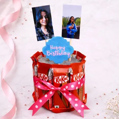A birthday cake made of chocolate! This KitKat cake is one of my most popular items. I add personalized photo toppers and a "Happy Birthday" sign to make it a fun and delicious surprise.