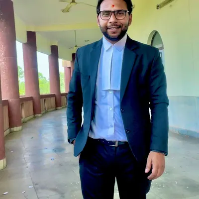 Dressed in my advocate's uniform, I am prepared to represent you in court. My goal is to be both a strong defender of your rights and an approachable advisor you can rely on.