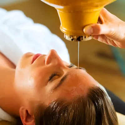 This image captures the essence of Shirodhara, one of the most calming Panchakarma therapies. It is a powerful way to eliminate toxins, balance doshas, and reset your overall health. I tailor the five procedures to each individual's doshic imbalance to manage chronic conditions and promote total wellness.
