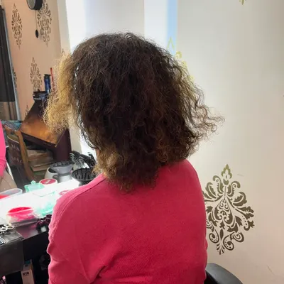 Before the cut. Melina's hair was ready for a reshape to bring out its best.