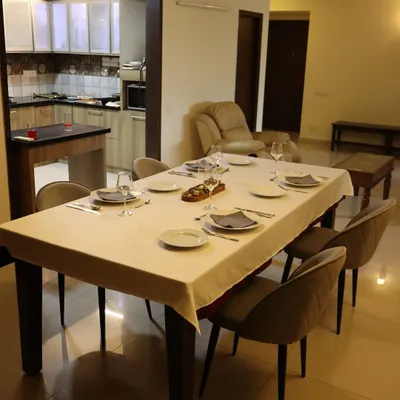 The table is set for an evening of culinary discovery. I believe the ambiance is just as important as the food, creating a warm and elegant setting for my guests.