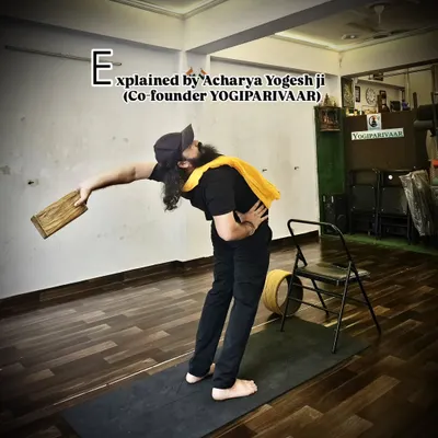Here I am demonstrating a supported side bend using a yoga block. This prop helps maintain stability and alignment, allowing for a deeper stretch along the side of the body while protecting the lower back.