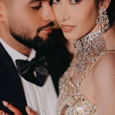 A glamorous and intimate close-up from an engagement night. We focus on the deep connection and sparkling chemistry between the couple.