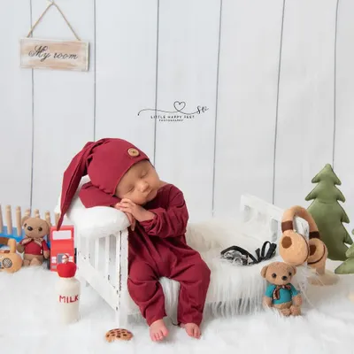 Welcome to my room! This adorable setup features a tiny bed, toys, and a personalized sign, creating a miniature version of a child's bedroom.