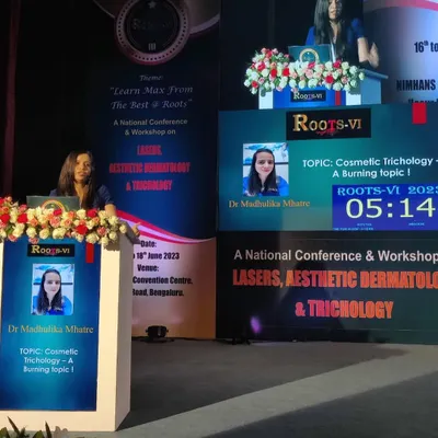 Here I am on stage at the ROOTS-VI conference, a national event focused on trichology and aesthetic dermatology. My talk centered on cosmetic trichology, a topic I am passionate about as it helps people understand the real science behind their hair products.
