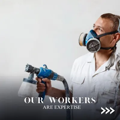 Our painters are experts in their craft. This image shows a professional using a spray gun, one of the tools we use to achieve a perfectly even and efficient finish on large surfaces. We always wear appropriate safety gear.