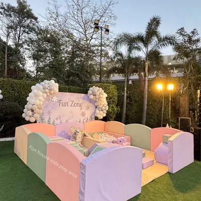 A beautiful outdoor setup of our pastel play area. The soft colors of the climbers and ball pit blend perfectly with the garden setting.