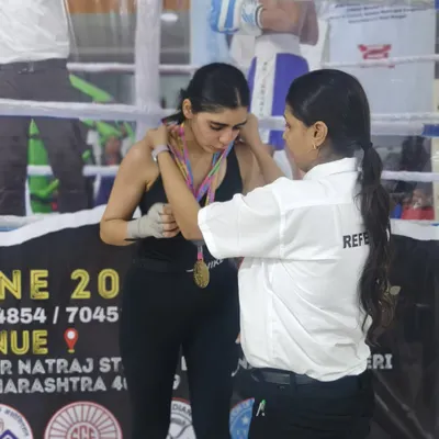 A proud moment for my student, receiving her medals after a successful run at the Mumbai district kickboxing tournament. She took home both a gold and a bronze.