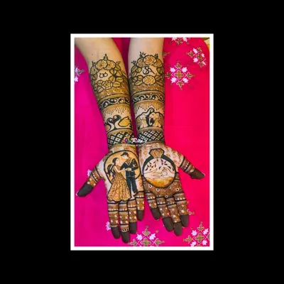 A perfect engagement mehendi design. One hand features a romantic couple portrait, while the other showcases a large engagement ring, symbolizing the occasion beautifully.