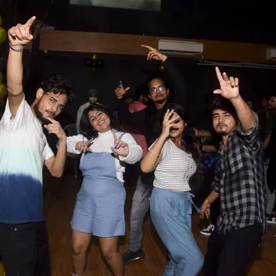 The energy of a college fresher's party is unmatched. I love capturing these fun, posed moments that show the excitement and camaraderie of the students.