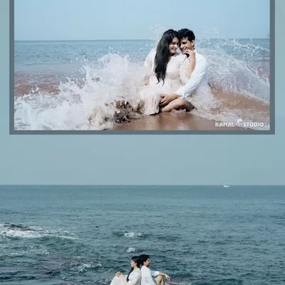 The perfect blend of romance and fun, with a playful splash in the waves and a serene pose on the rocks against the vast ocean in Goa.