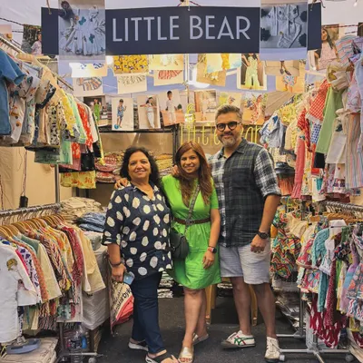 This picture means the world to me. Surrounded by my biggest supporters, my mother and my husband, at our exhibition stall. Their quiet strength and constant presence are the backbone of Little Bear. This is truly a family business built on love.