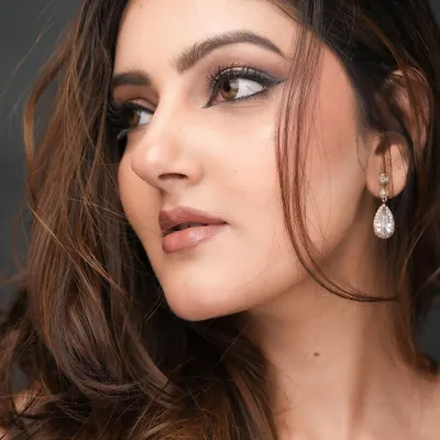 A close-up of my signature glam look. I love creating a sharp, extended winged liner paired with a soft brown smokey eye and a glossy nude lip for ultimate sophistication.