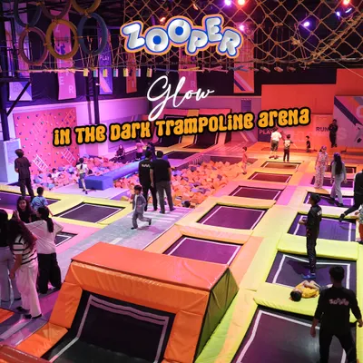 Welcome to our glow-in-the-dark trampoline arena. The lights, the music, and the endless trampolines create an atmosphere you won't find anywhere else.