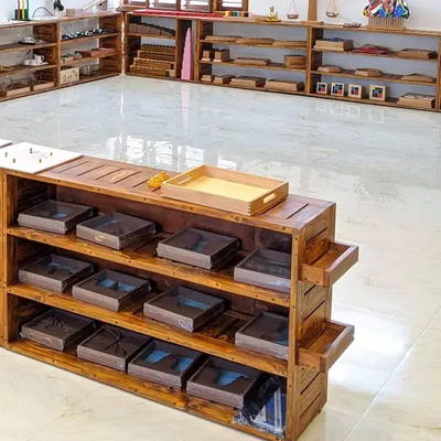 This is what I mean by a 'prepared environment'. The low, open shelves are filled with beautiful, purposeful materials, all within a child's reach. This space is intentionally designed to invite exploration and allow children to choose their own activities, fostering independence and a love for learning.