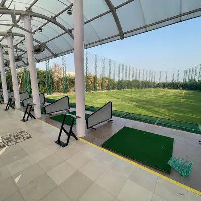 A clear view of our pristine practice bays, ready for you to start your session. Each bay provides ample space for you to focus on your golf practice.