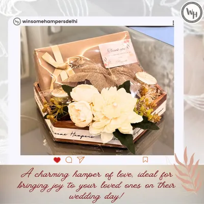 A charming wedding hamper designed to bring joy. This hexagonal basket is filled with handpicked items and adorned with beautiful sola wood flowers, making it a perfect token of love for the newlyweds.